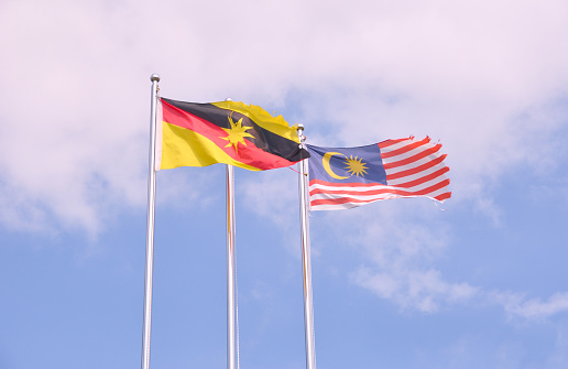 malaysian-flag-next-to-a-sarawakian-flag