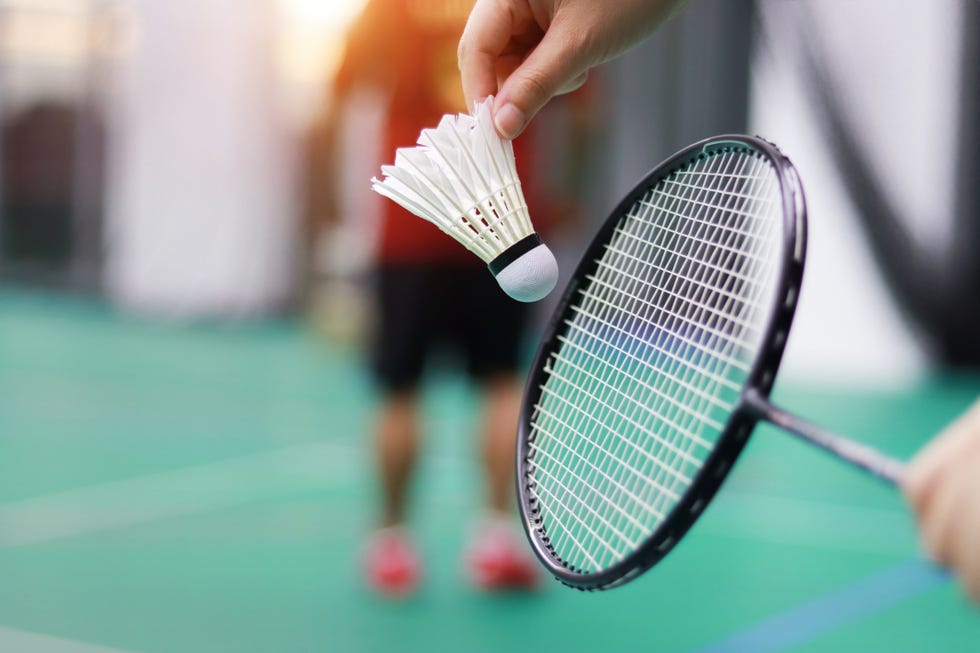 men-playing-badminton-exercise-badminton-royalty-free-image-1722422400