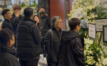 林子祥、高海宁凌晨赶到 送许绍雄一程