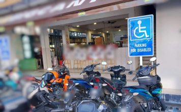 女子斥当局不作为 OKU泊车位成摩托停车场