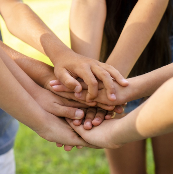 boys-girls-bringing-their-hands-together