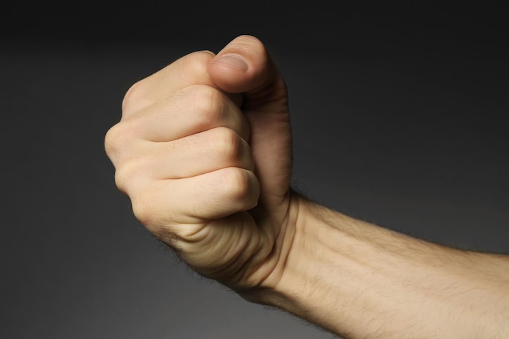 male-fist-grey-background_392895-426161
