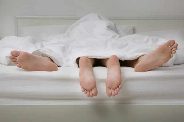 depositphotos_159450968-stock-photo-feet-of-couple-having-sex