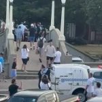 澳洲恐袭6分钟103声枪响 有民众脚踢枪手发泄