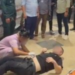 男子因“停车纠纷”拔枪想射保安 结果枪走火射中自己