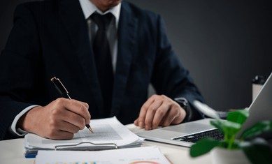 hands-holding-pen-signing-paperwork-260nw-2646257341