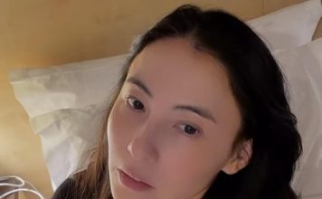 张柏芝机场忙不停 一边打电话一边赶行程