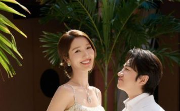 夫妻出游被拍 李亚男表情成焦点