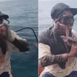 渔夫捕八爪鱼遭狂缠 脸部现惊悚画面