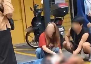 公寓外惊见血案 女子遭刺倒地血泊中