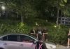 华裔男疑酒后路中叫嚣 拍打轿车最终被带走