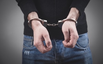 caucasian-man-hands-handcuffs_22