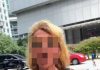 手持“以色列”标语横幅现身 女子遭警方带走调查