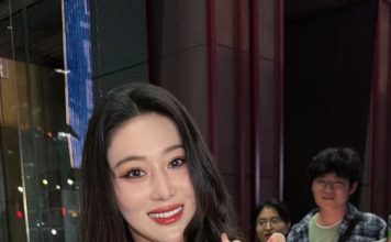 紫色露肩装太吸睛 女星火辣曲线藏不住
