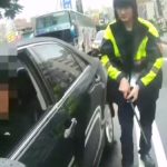 车停路中央司机叫不醒 警破窗惊见毒驾
