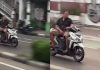 男子危险侧坐骑摩哆惹议 网民:可能小时候不够快乐