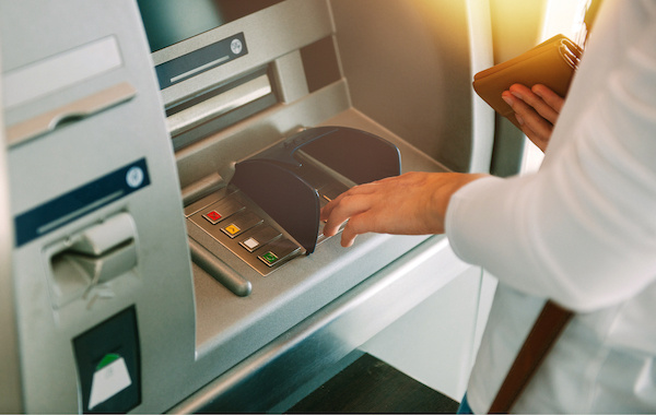 Woman,Using,Atm,Holding,Wallet,An,Pressing,The,Pin,Security