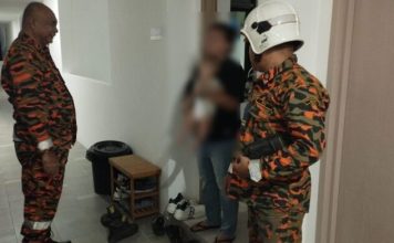 女子抱婴疑欲轻生 丈夫一句话成功劝回