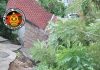 住宅区突发土崩事故 围墙几乎坍塌毁损