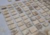 佛像底座惊藏两只古罐 打开竟见600尊佛牌