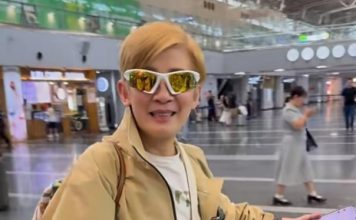 相爱多年依旧热恋 吴君如陈可辛机场高调放闪