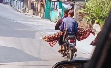 埋葬逾40年遗体仍完整 家属用摩哆运尸震惊路人