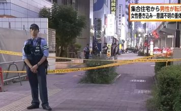 人在路上走祸从天降 女子遭坠楼男砸中惨死