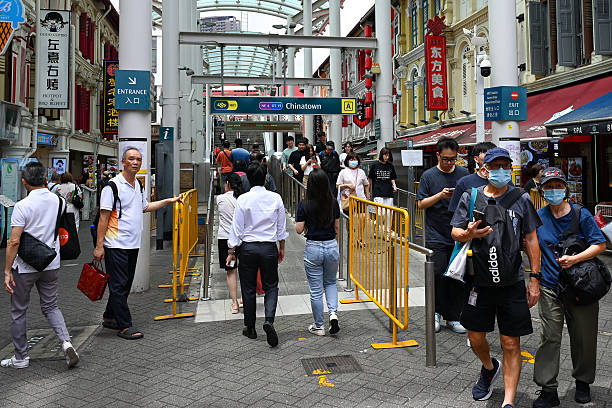 people-walk-along-the-street-nex