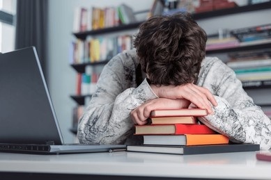 stressed-teenage-student-overwhe