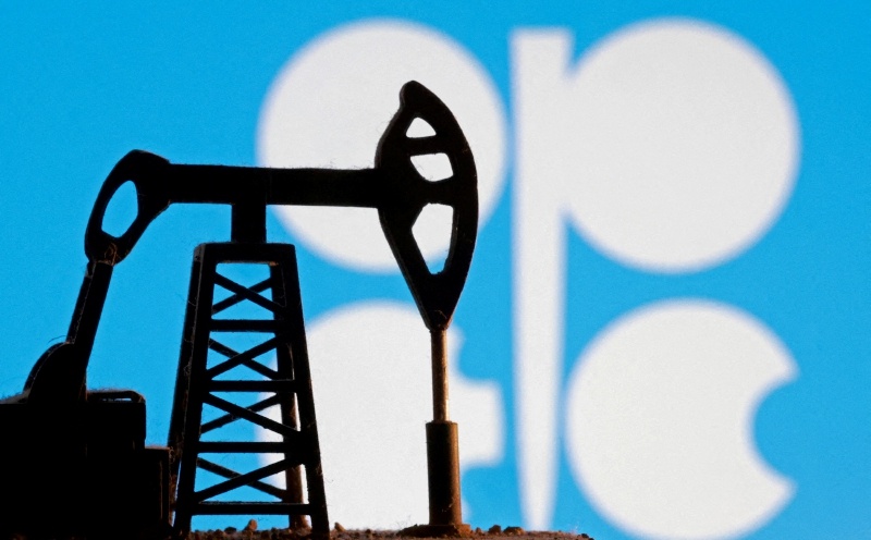 FILE PHOTO: Illustration shows oil pump miniature model and OPEC logo