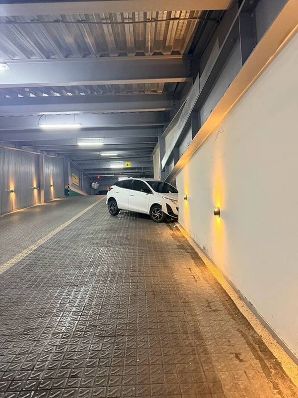 Car-crashes-through-wall-260831