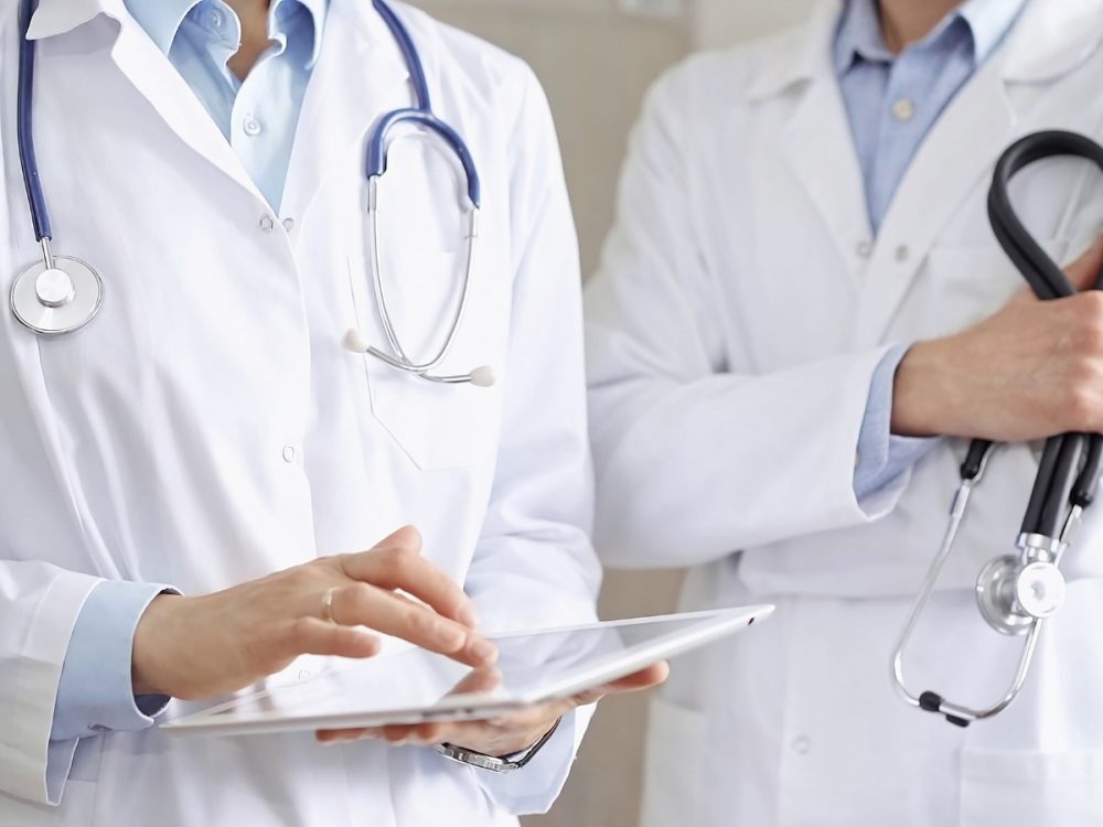 Doctors-in-coats_shutterstock