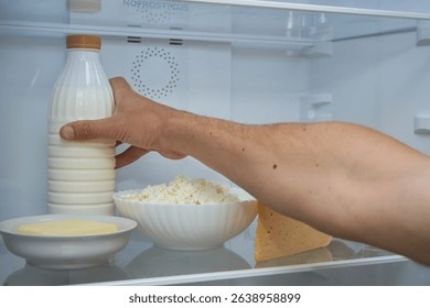 hands-take-kefir-fridge-man-260n