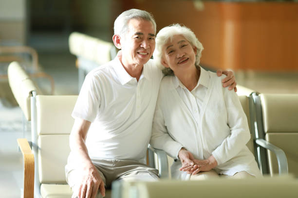 portrait-of-senior-couple-sittin