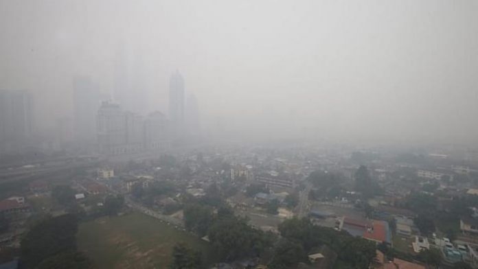 1276754-20140722-wld-msia-haze-1